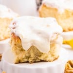 Closeup of a Banana Cinnamon Roll on a white plate.