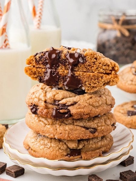 A stack of Brown Butter Chocolate Chip Cookies on white plate.