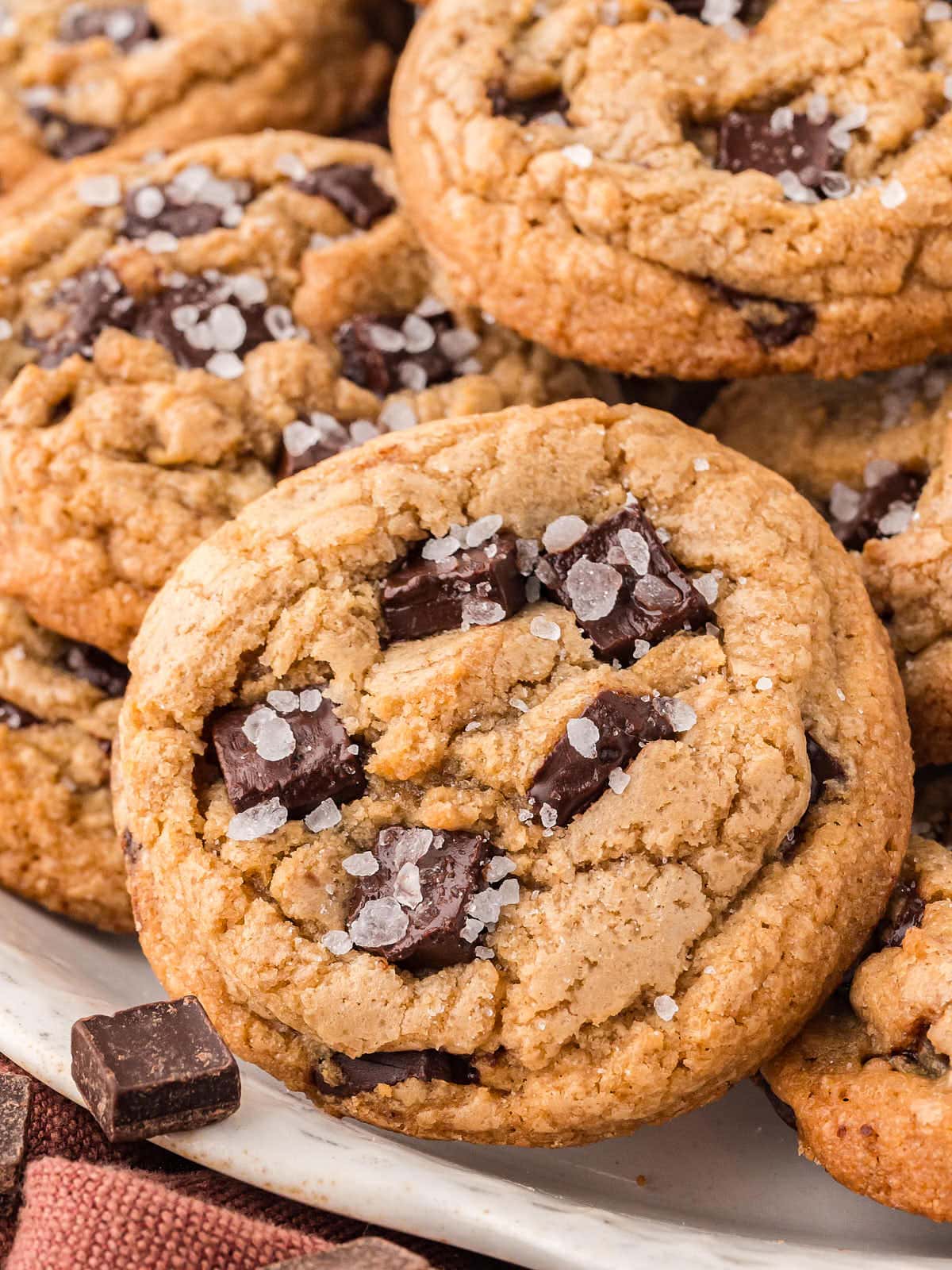 Closeup of a Brown Butter Chocolate Chip Cookies on a white plate.