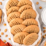 Peanut Butter Cookies served on a white cookie platter.