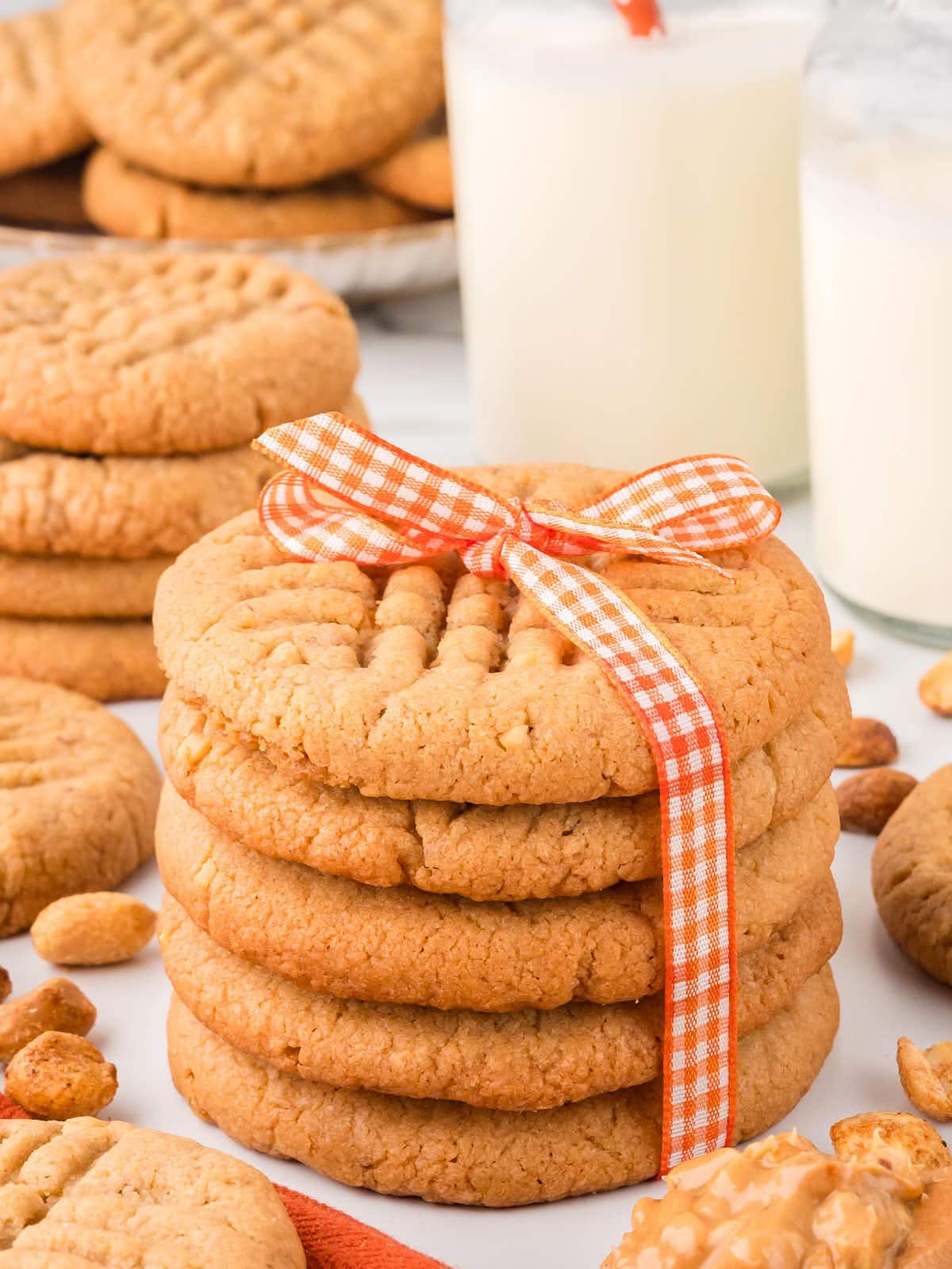 A stack of Peanut Butter Cookies tied with a ribbon.