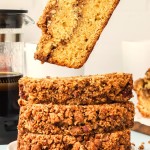 Picking up a slice of Pecan Bread.
