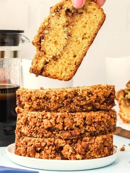 Picking up a slice of Pecan Bread.