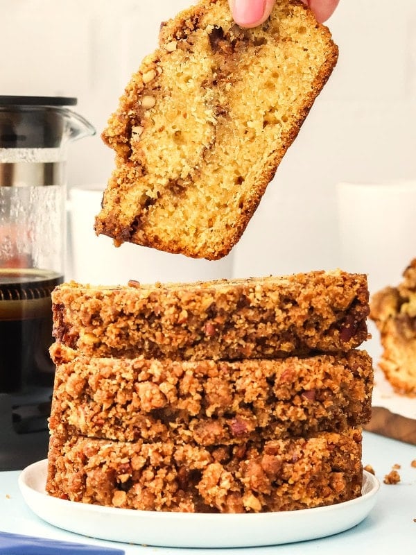 Picking up a slice of Pecan Bread.