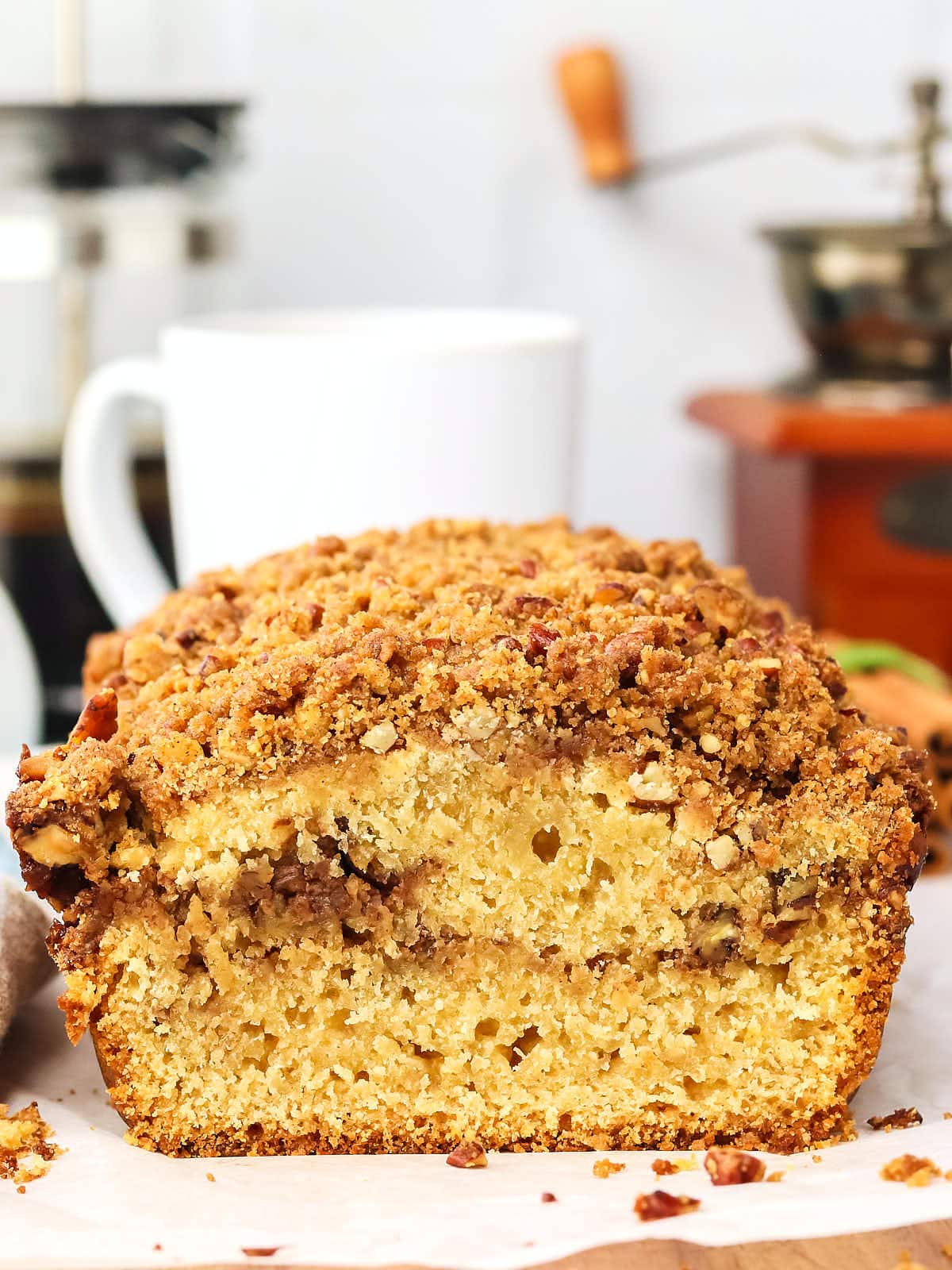 A loaf of Pecan Bread with a cinnamon crumb topping.