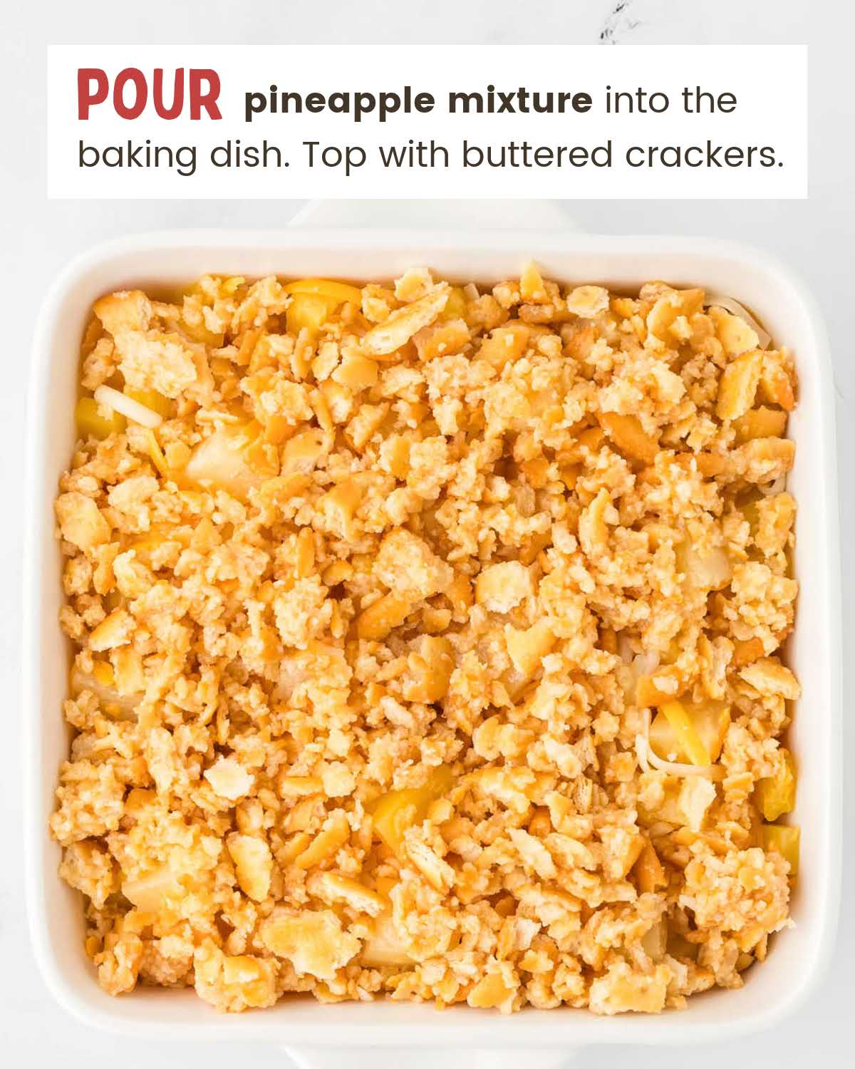 Unbaked Pineapple casserole in a baking dish.