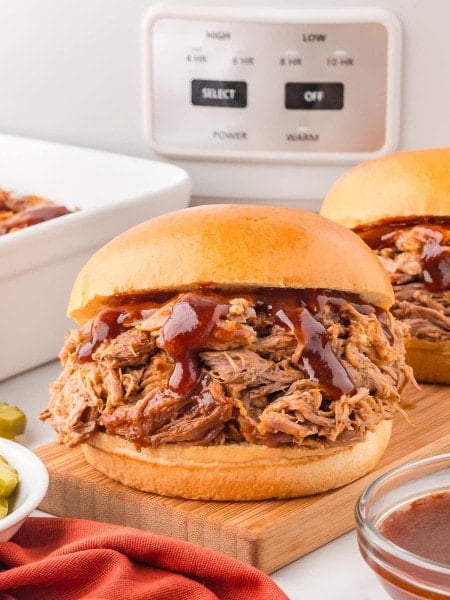 Pulled Pork made in a slow cooker and served on a bun.