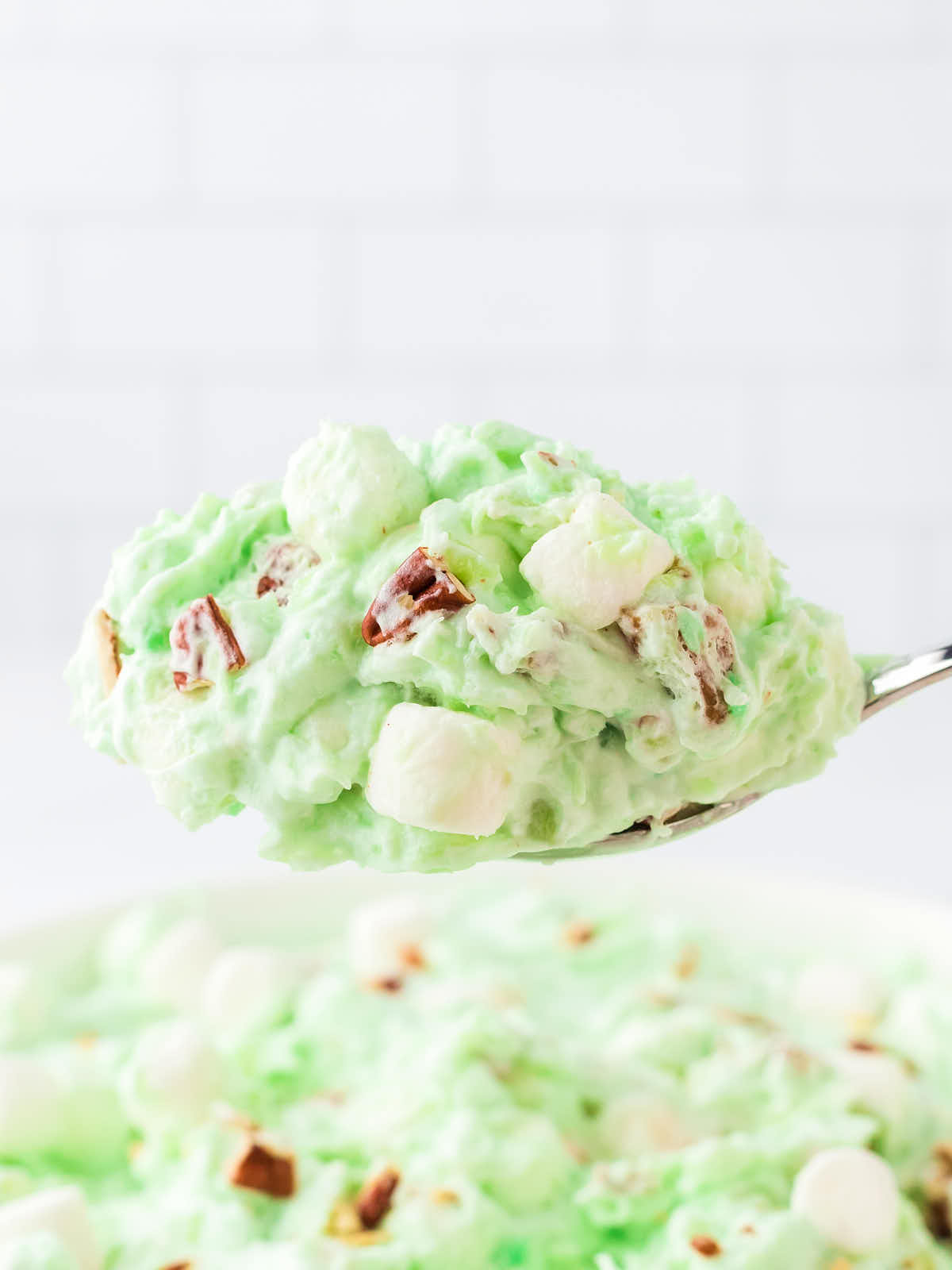 A spoonful of Watergate Salad.