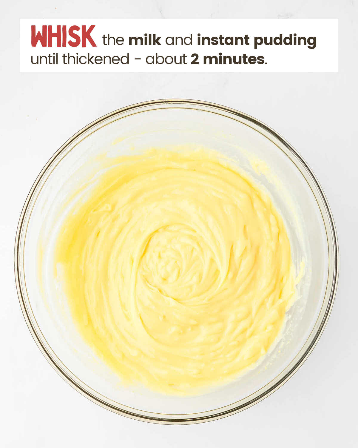 Milk and pudding mix in a bowl.