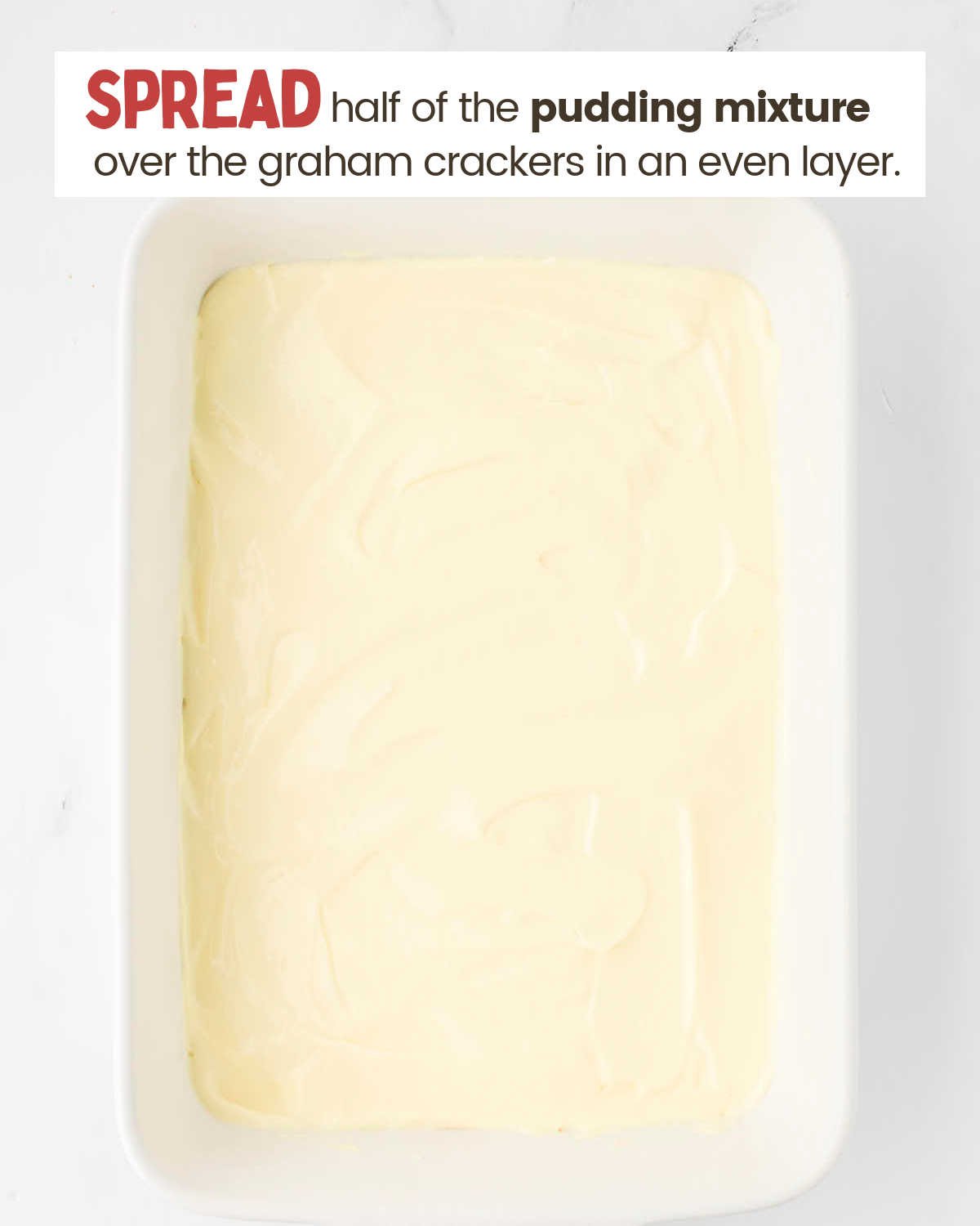 Graham crackers covered with a pudding mixture in a dish.