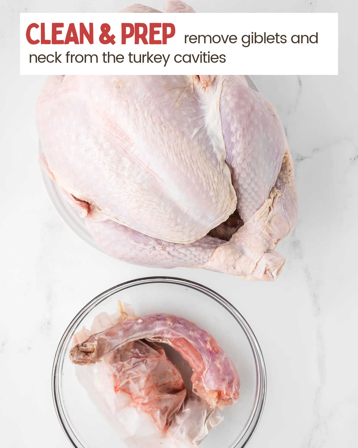 Removing the giblets and neck from inside of the turkey.