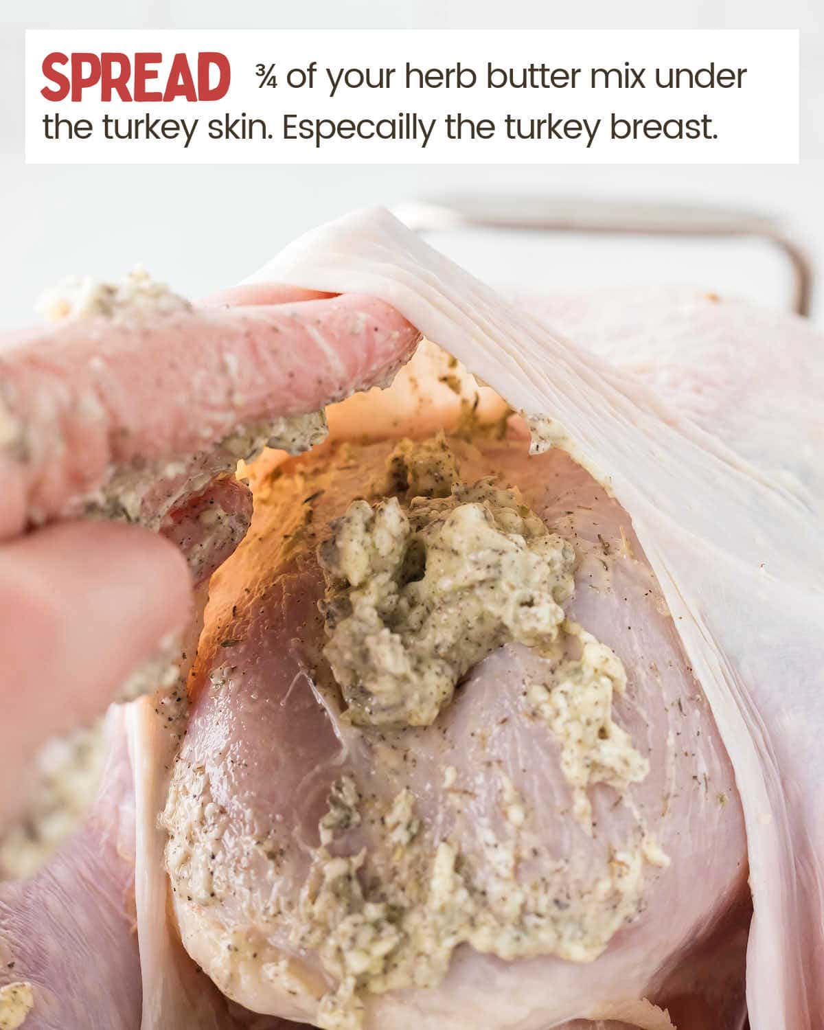 Spread the herb butter mix under the skin.