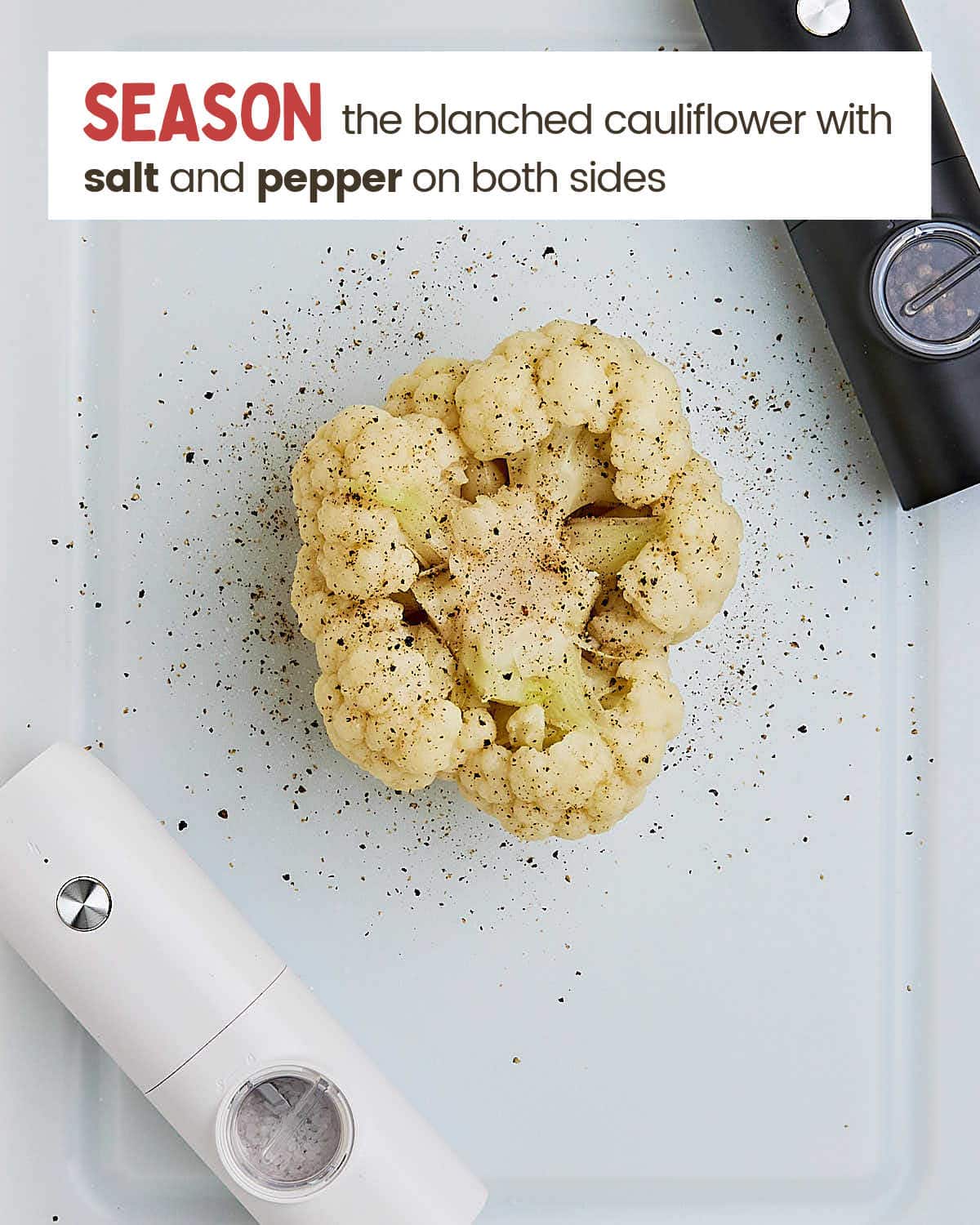 Season Whole Roasted Cauliflower with salt and pepper.