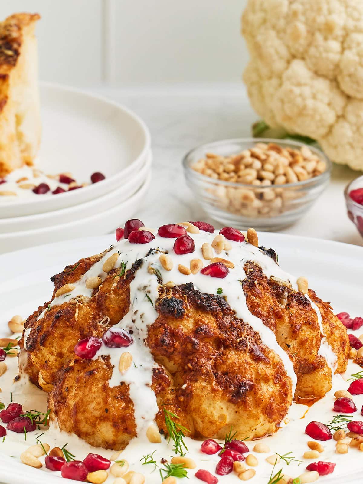 A Whole Roasted Cauliflower served with a Lemon Cream sauce.