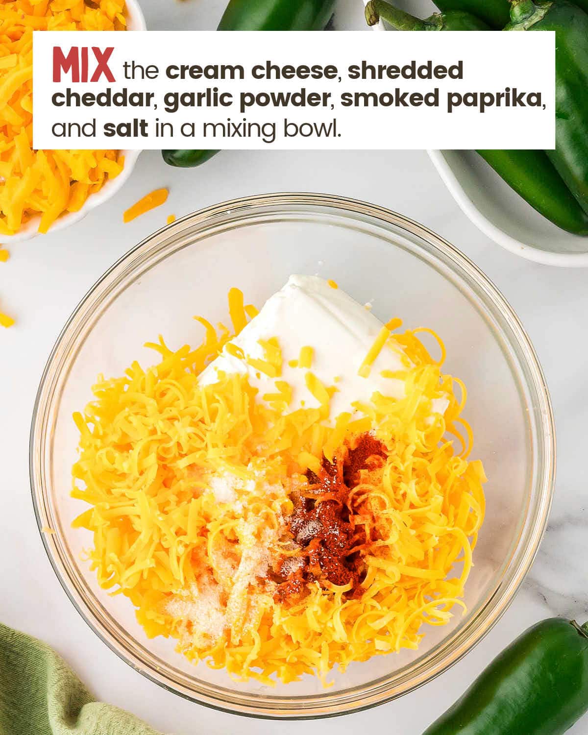 Ingredients to make a cheese mixture in bowl.