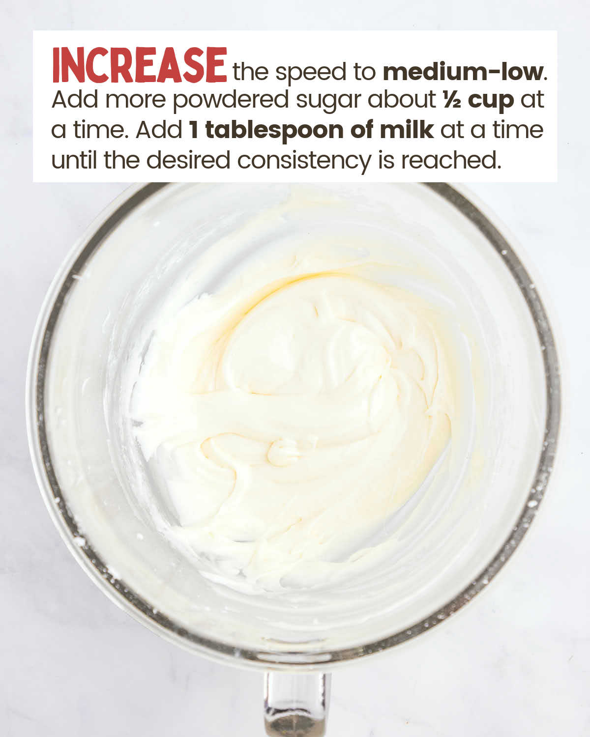 Icing mixture in a glass bowl.