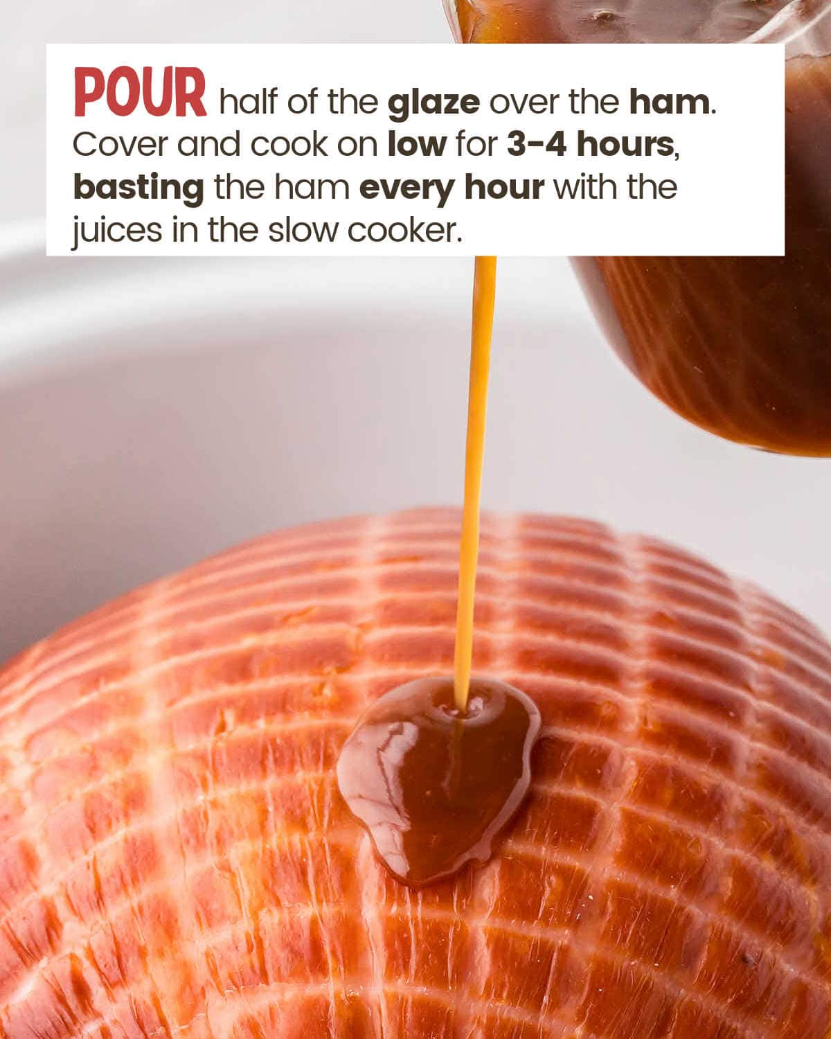 Glazed being poured over ham in a crockpot.