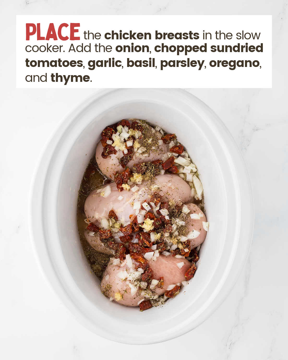 Chicken breasts with garlic and spices in a slow cooker.
