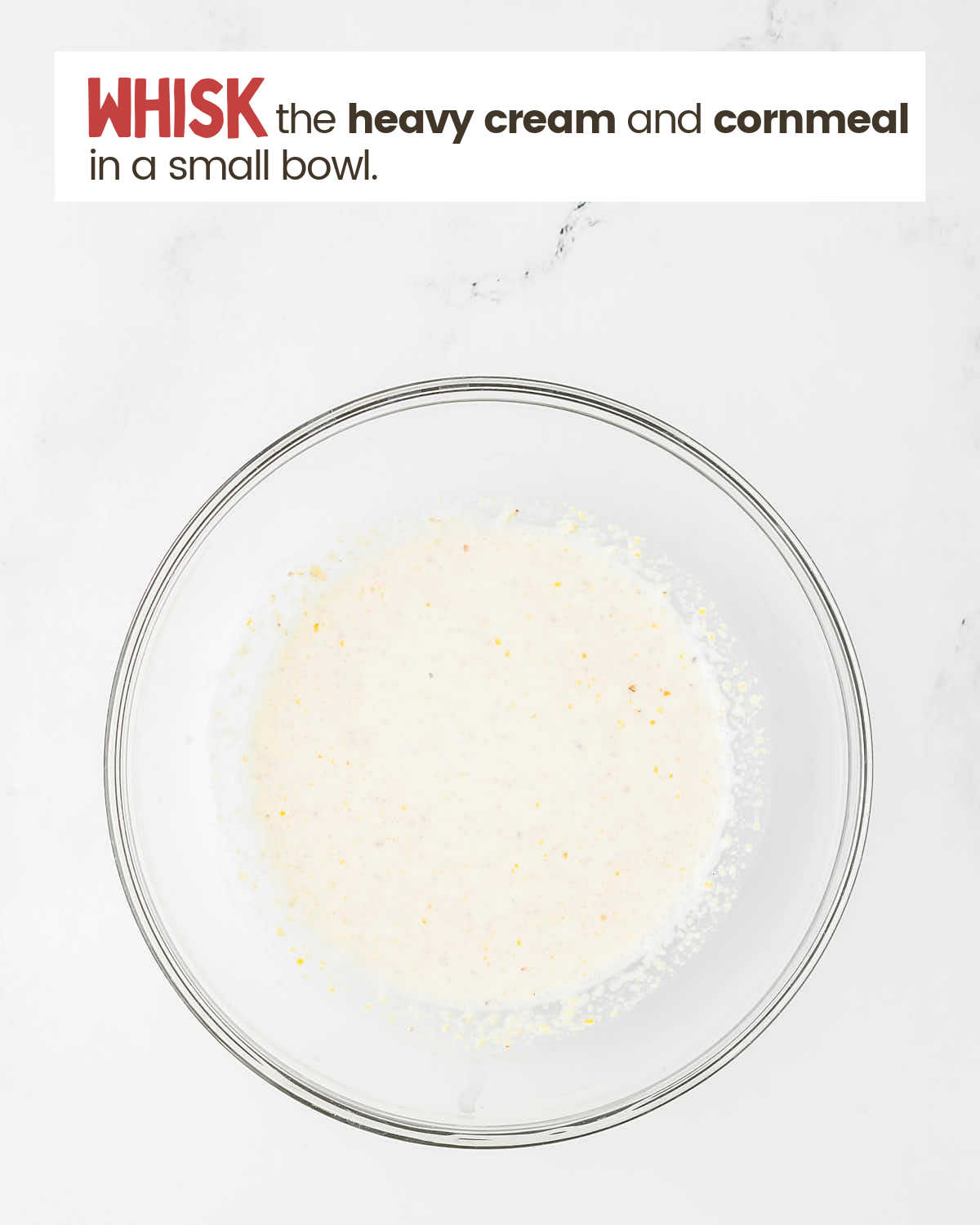 Heavy cream and cornmeal mixture in a small bowl.