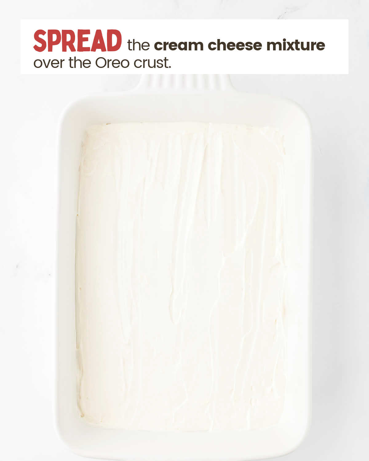 Cream cheese layer in a in a baking dish.