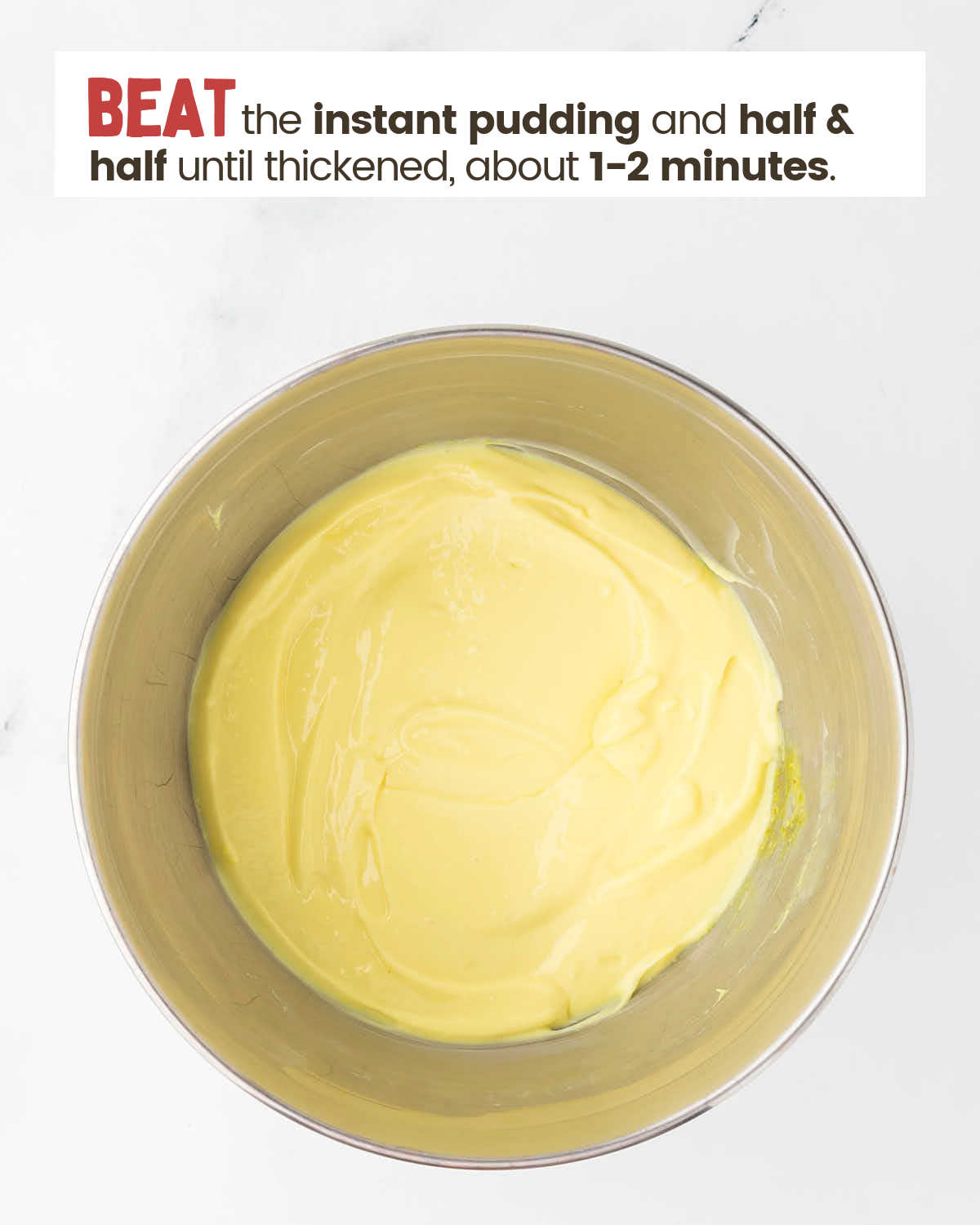 Lemon pudding mixture in a bowl.