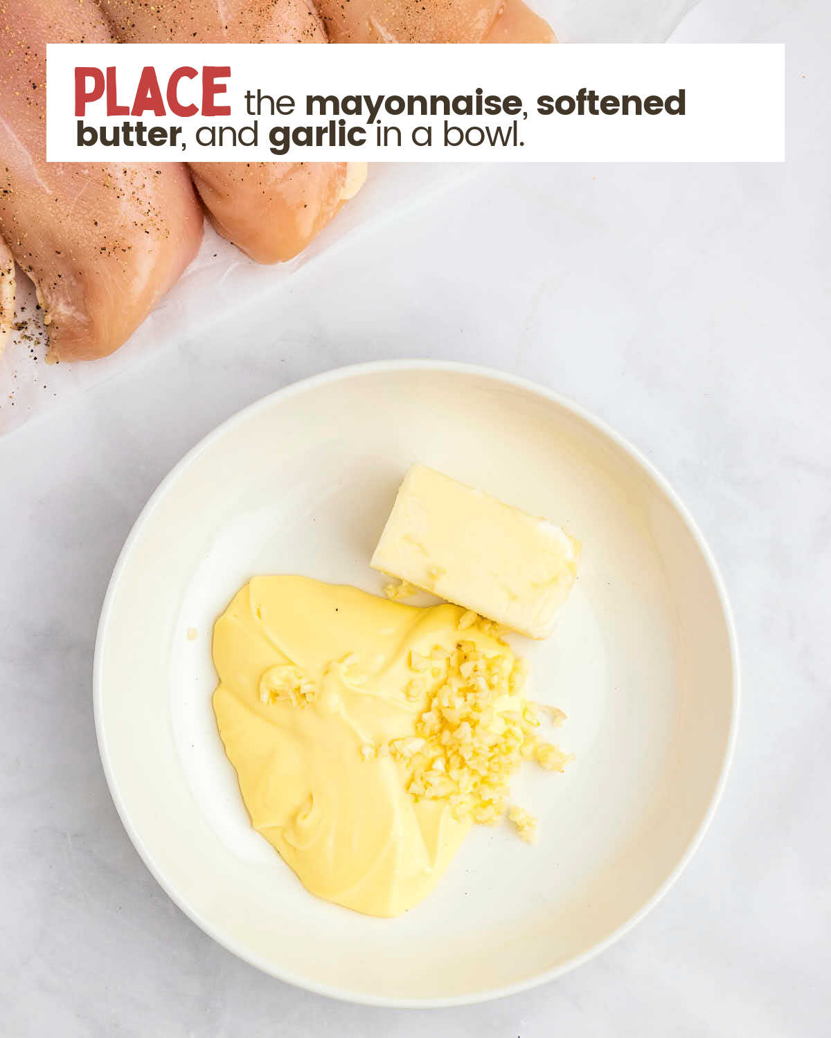 Butter, garlic, and mayonnaise in a bowl.