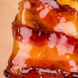 Closeup of a single Bacon Wrapped Jalapeno Poppers.