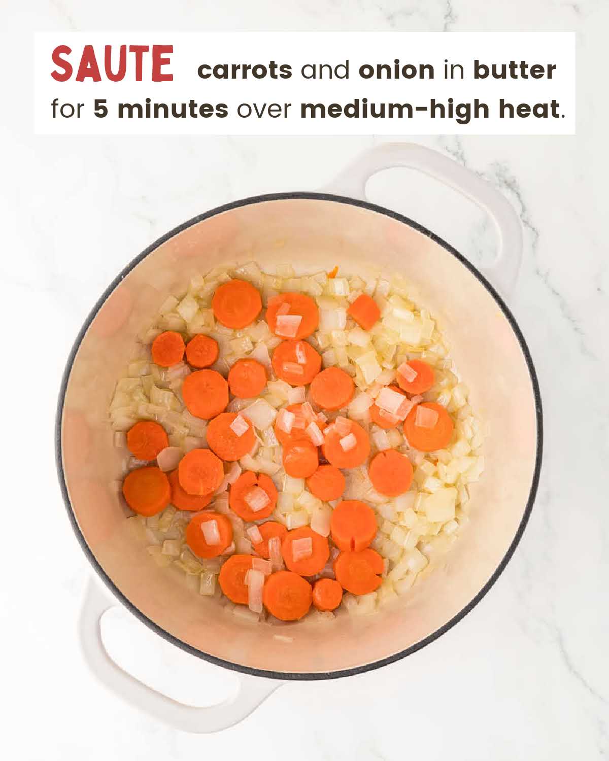 Onions and carrots in a large pot.