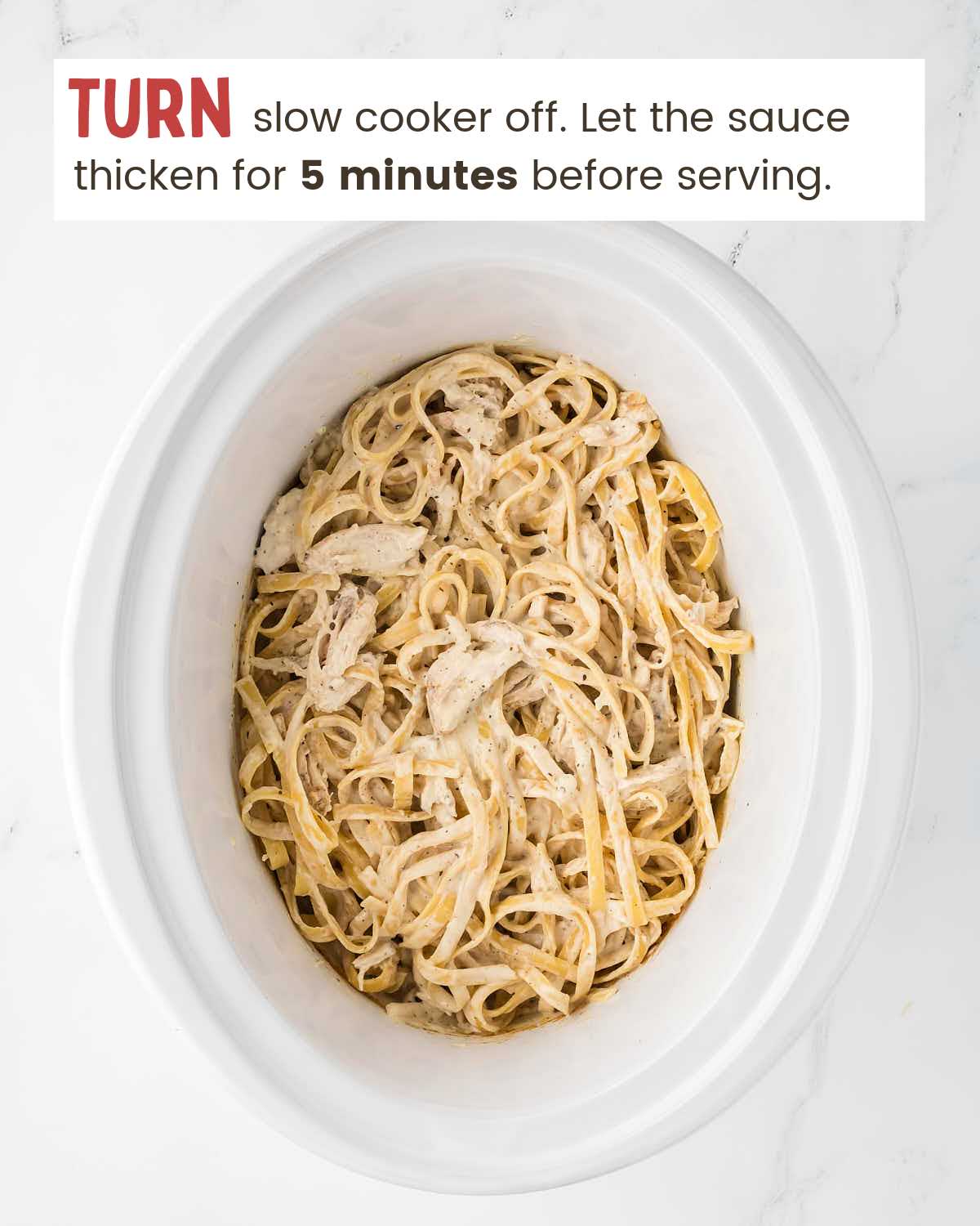 Chicken Alfredo in a slow cooker.
