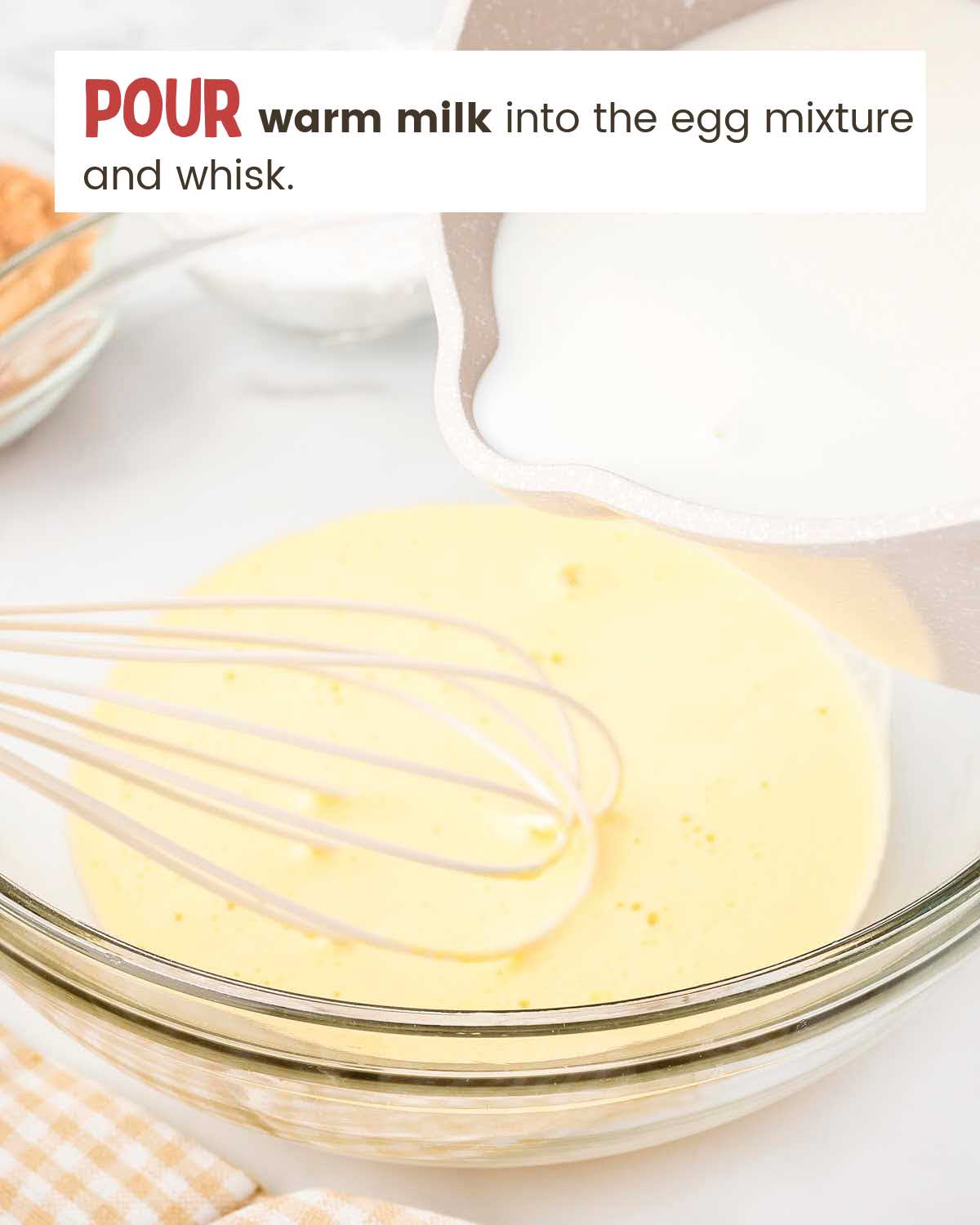 Milk is poured into a bowl with other custard ingredients.
