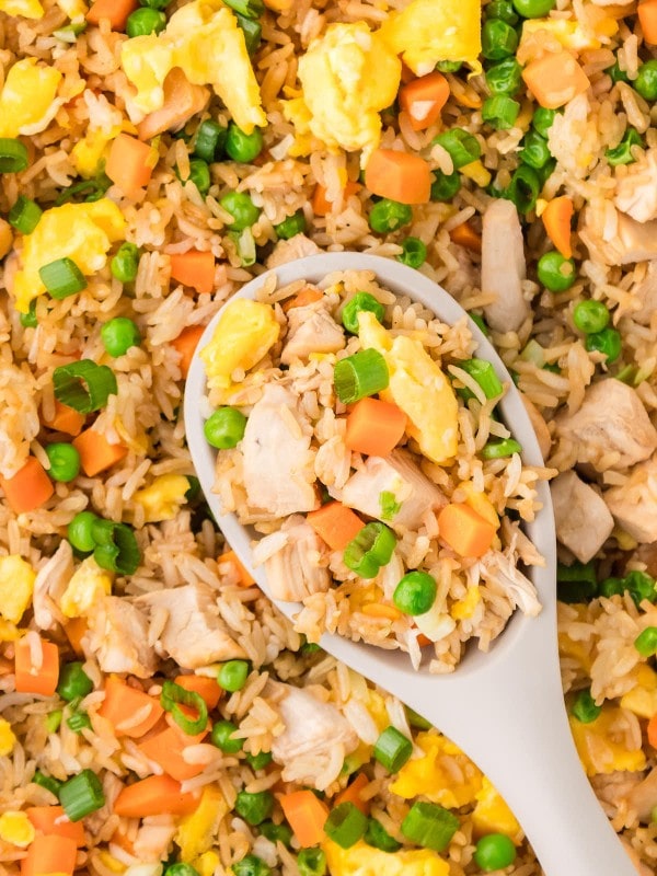 A serving spoon of Fried rice.