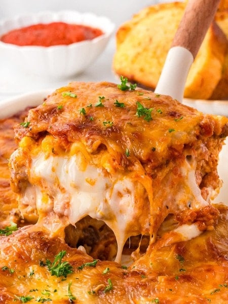 A spatula with a slice of homemade Lasagna.