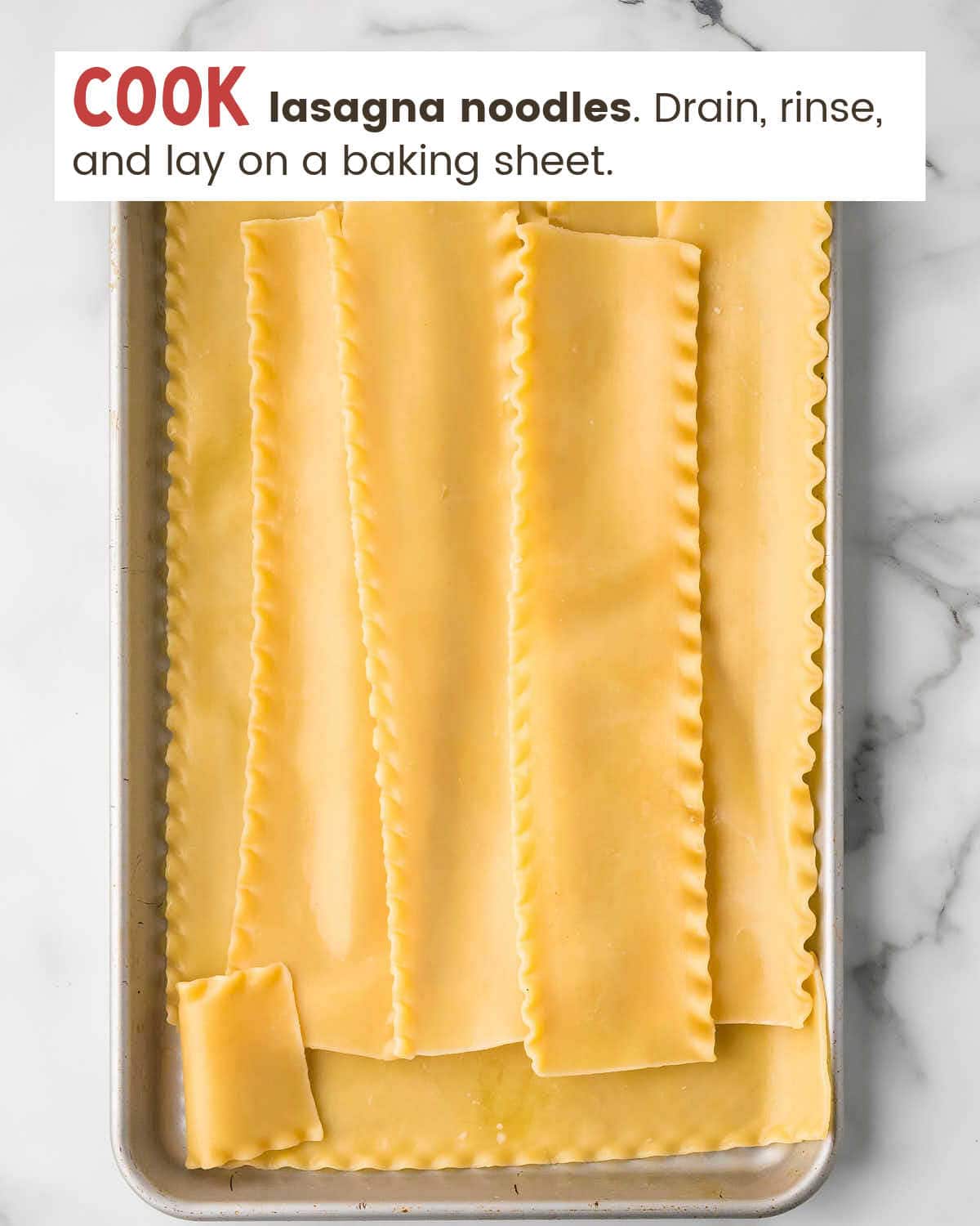 Cooked lasagna noodles on a tray. 