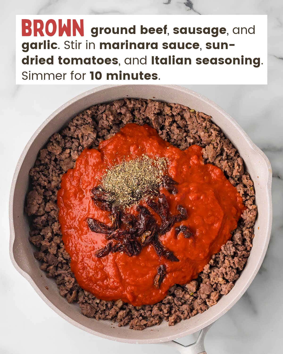 Browned meat, marinara sauce, sun-dried tomatoes, and Italian seasoning in a skillet.