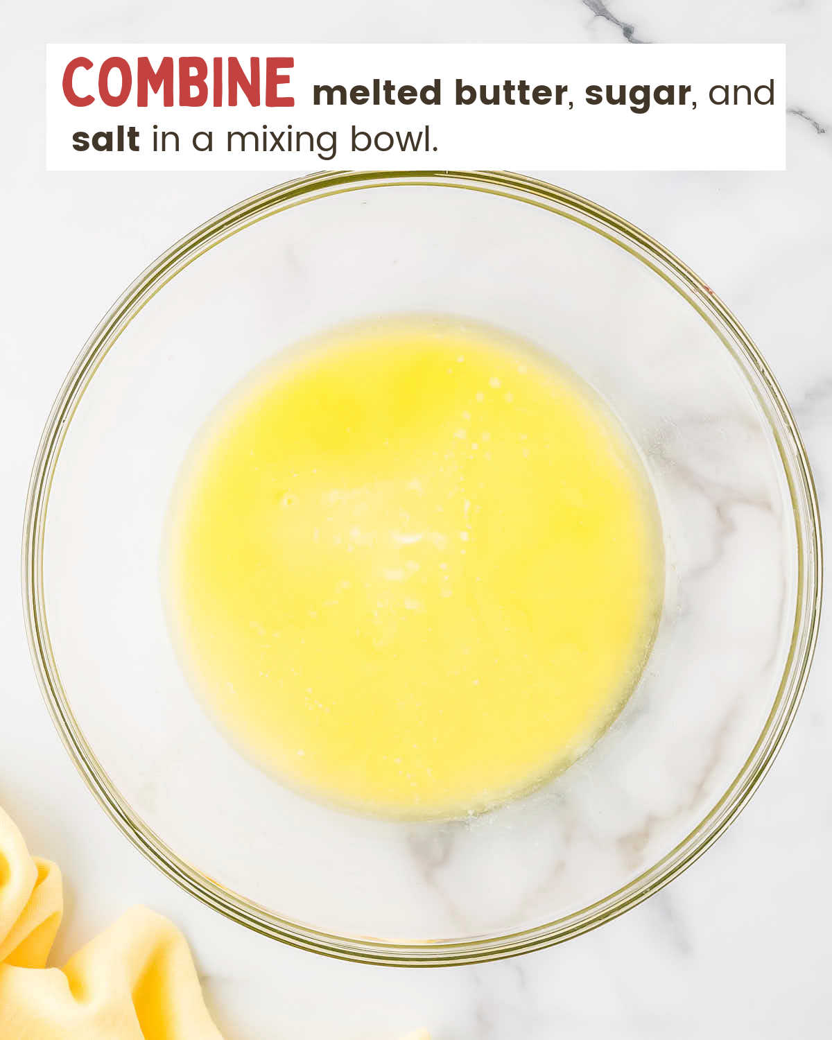 Melted butter, sugar, and salt mixed in a bowl. 