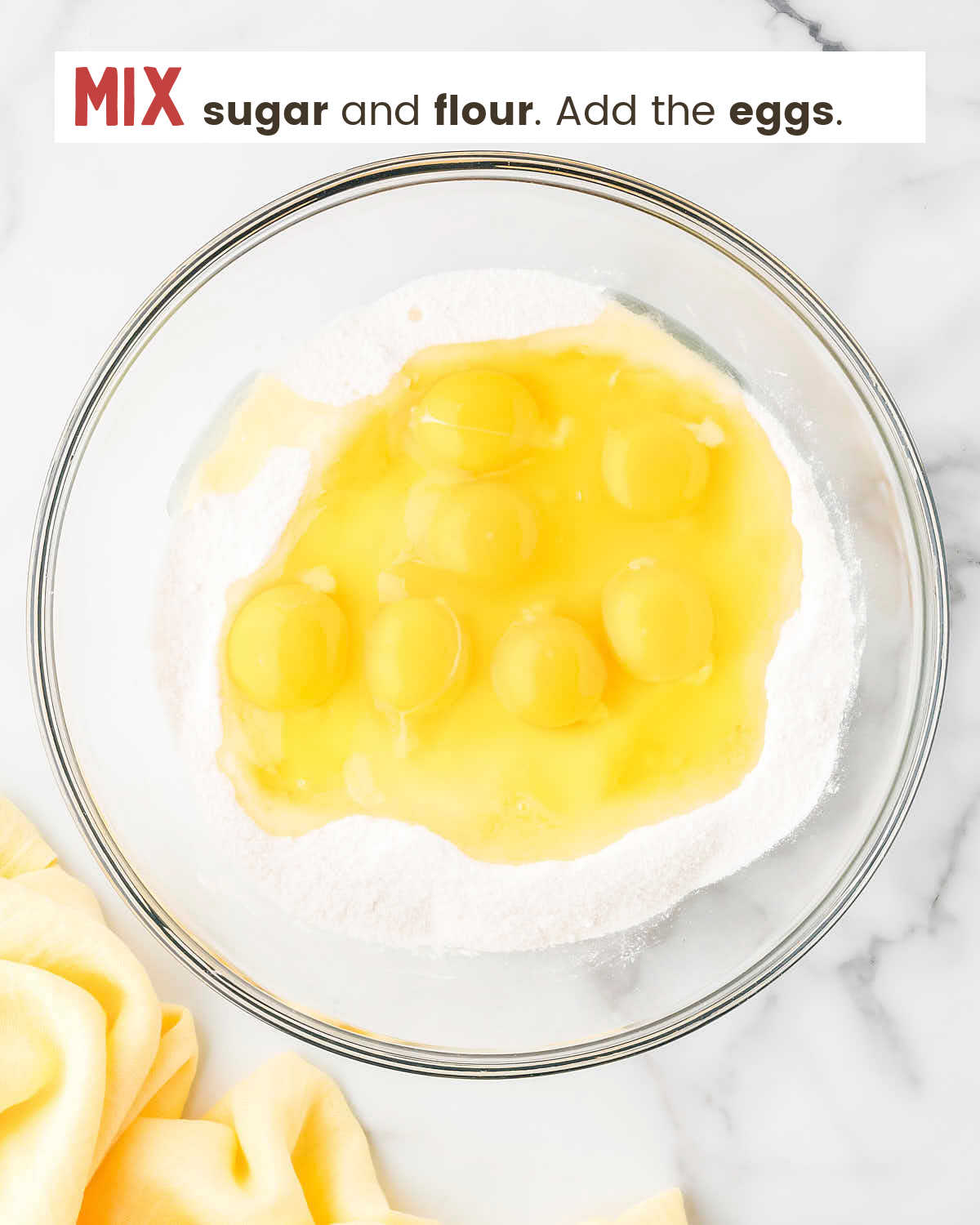 Sugar, flour, and eggs in a bowl.