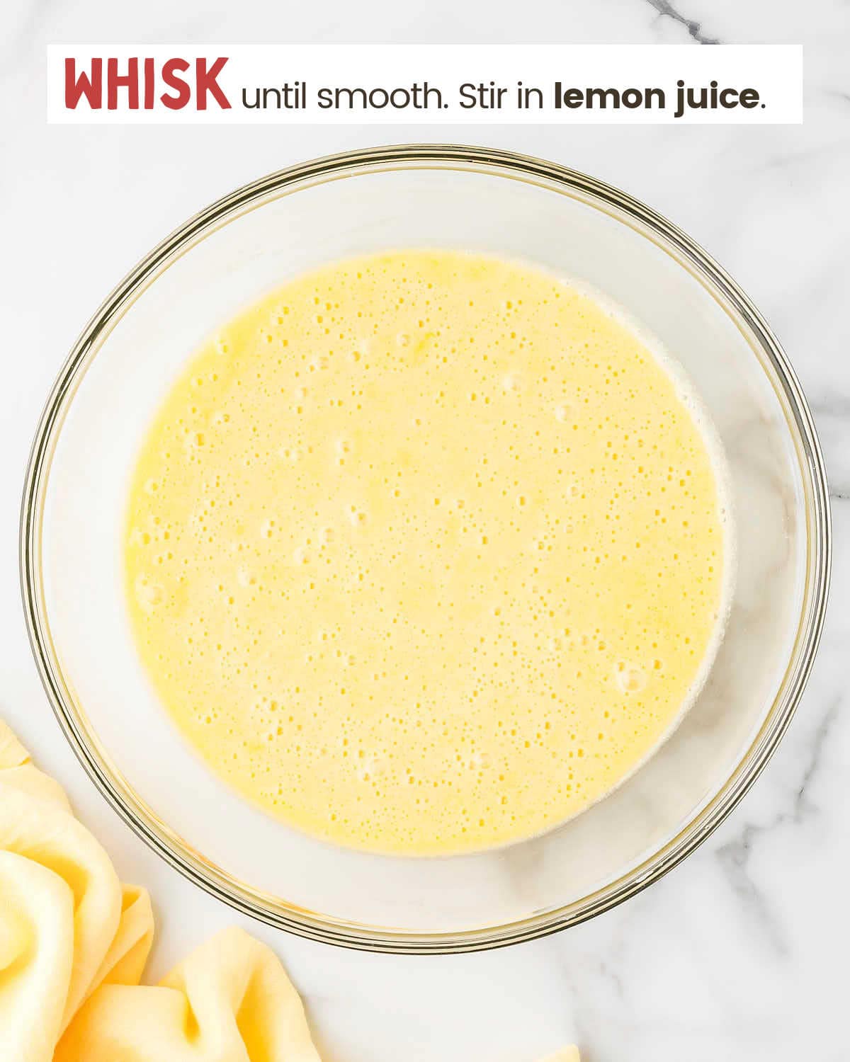 Whisked sugar, flour, and eggs in a bowl.