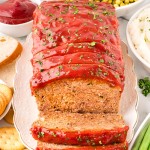 Sliced Meatloaf on a white plate.