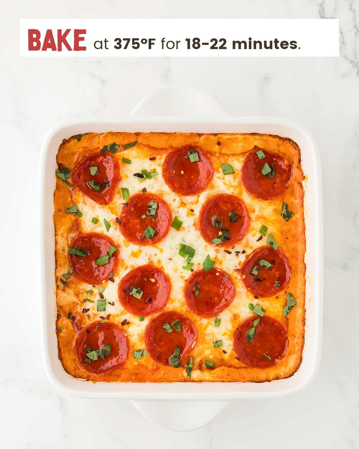 Baked pizza dip in a dish.