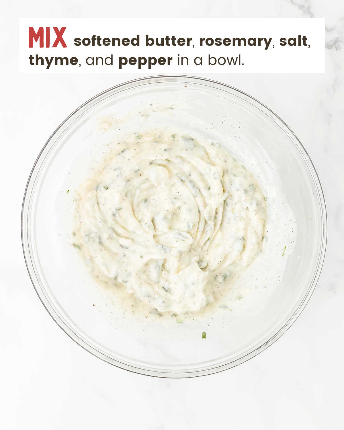 Herb butter mixture in a bowl. 