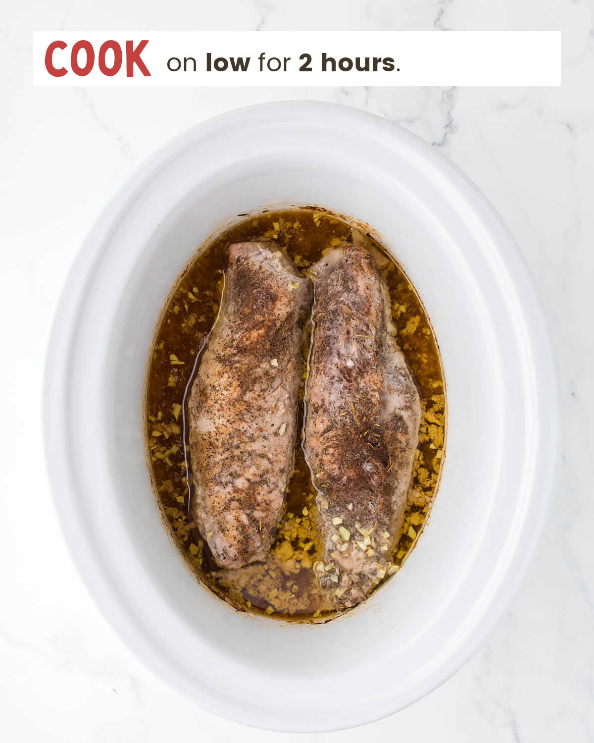 Pork tenderloins in a slow cooker.