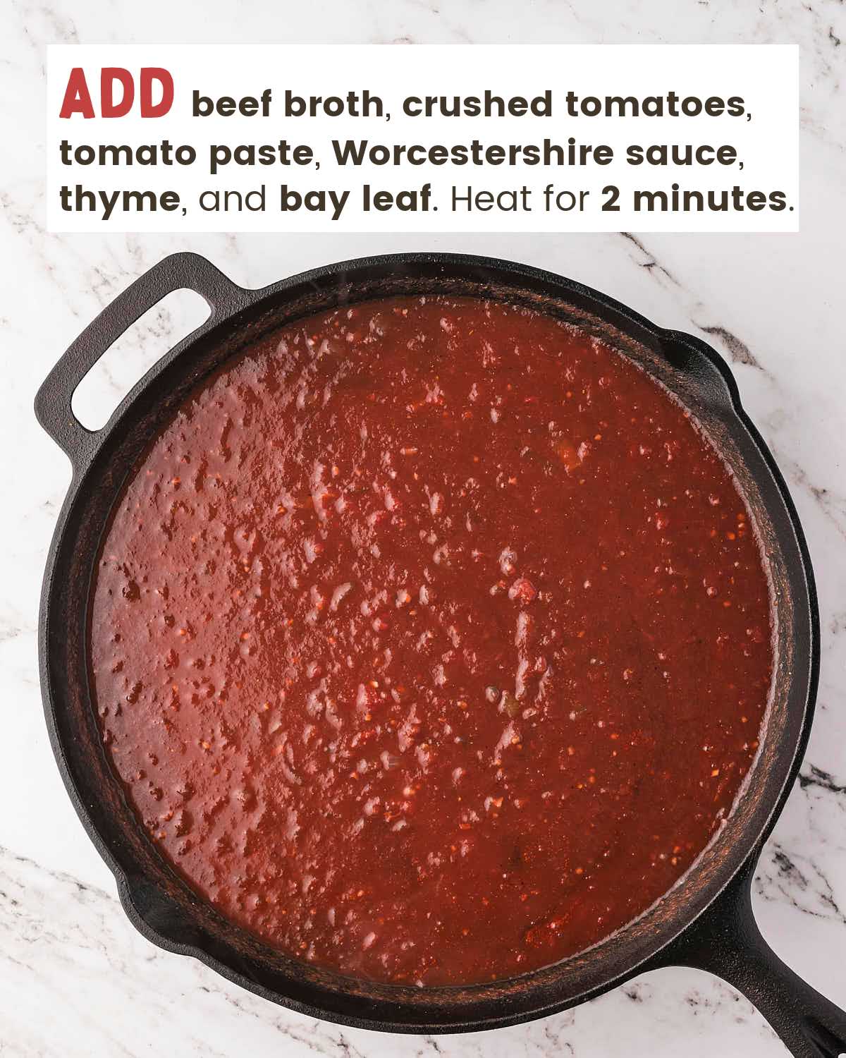 Red wine sauce in a cast iron pan.