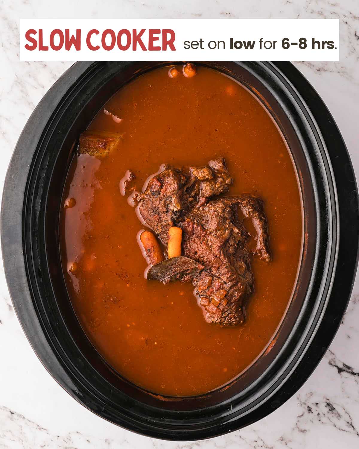 Slow cooker pot roast after cooking on low for 6-8 hours in a rich sauce.