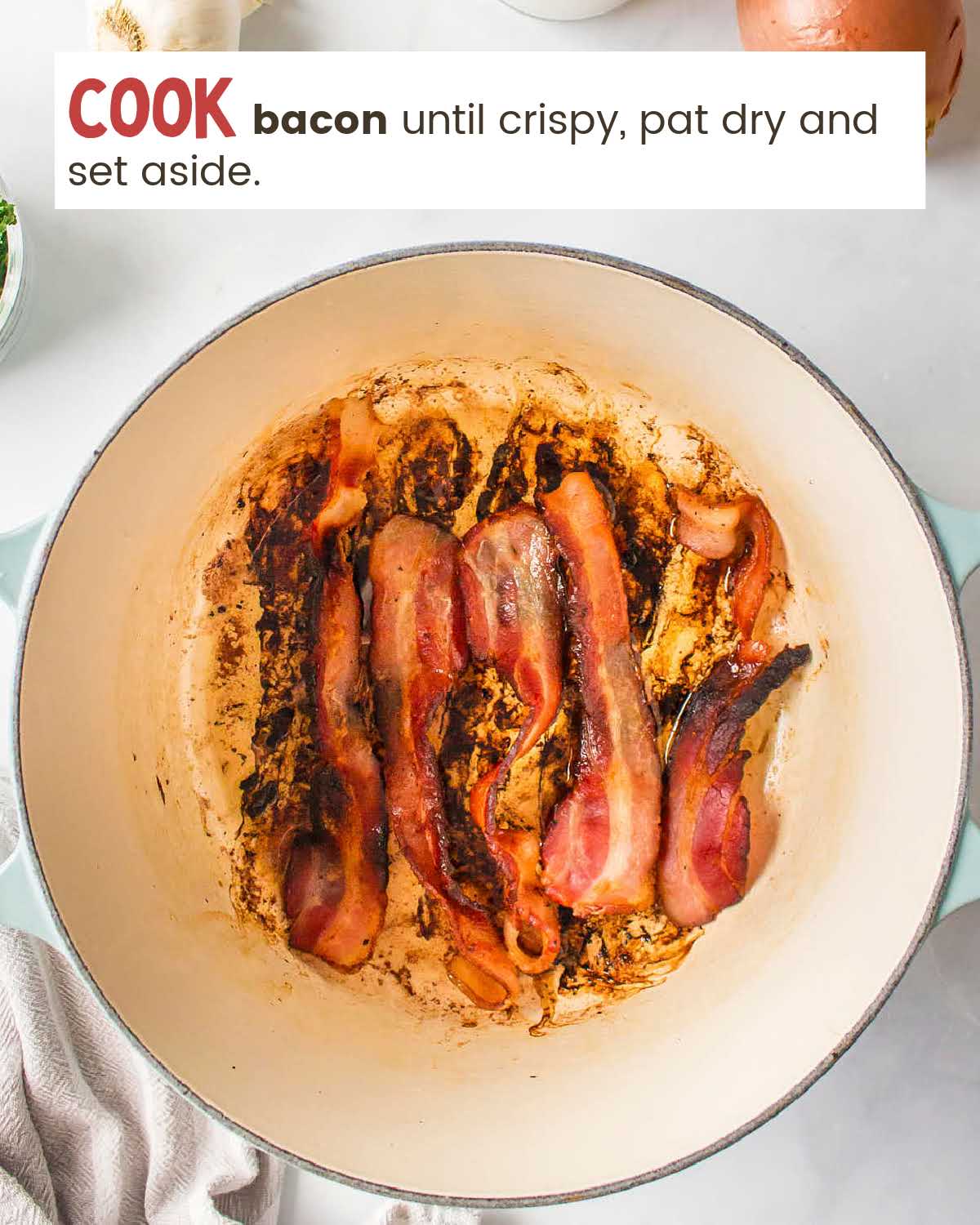 Bacon frying in a pot. 