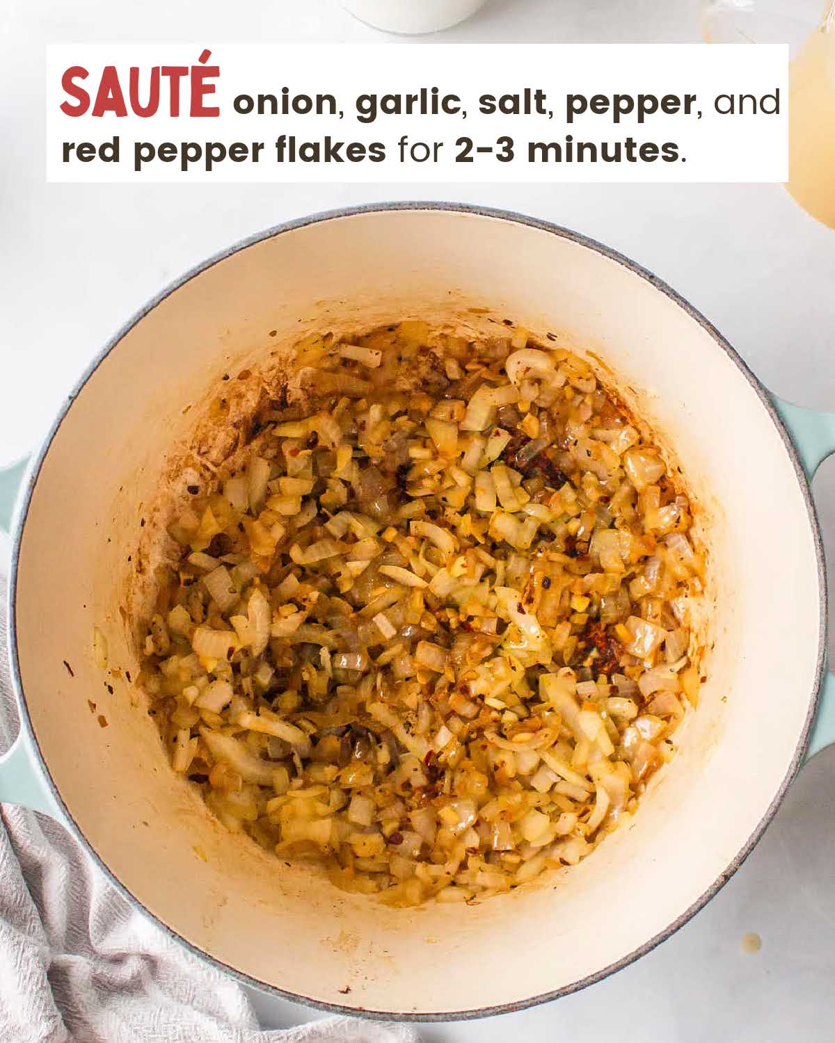 Onions, garlic, and seasonings in a pot.