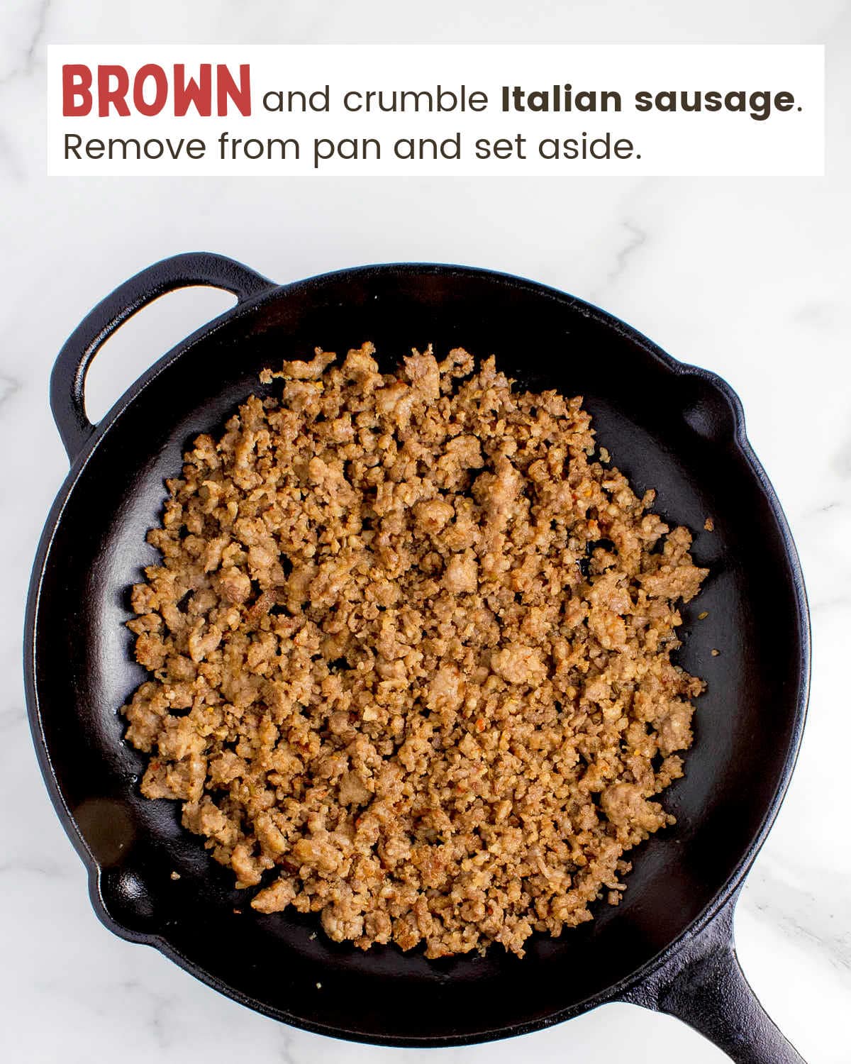 Browned ground sausage in a cast iron skillet. 