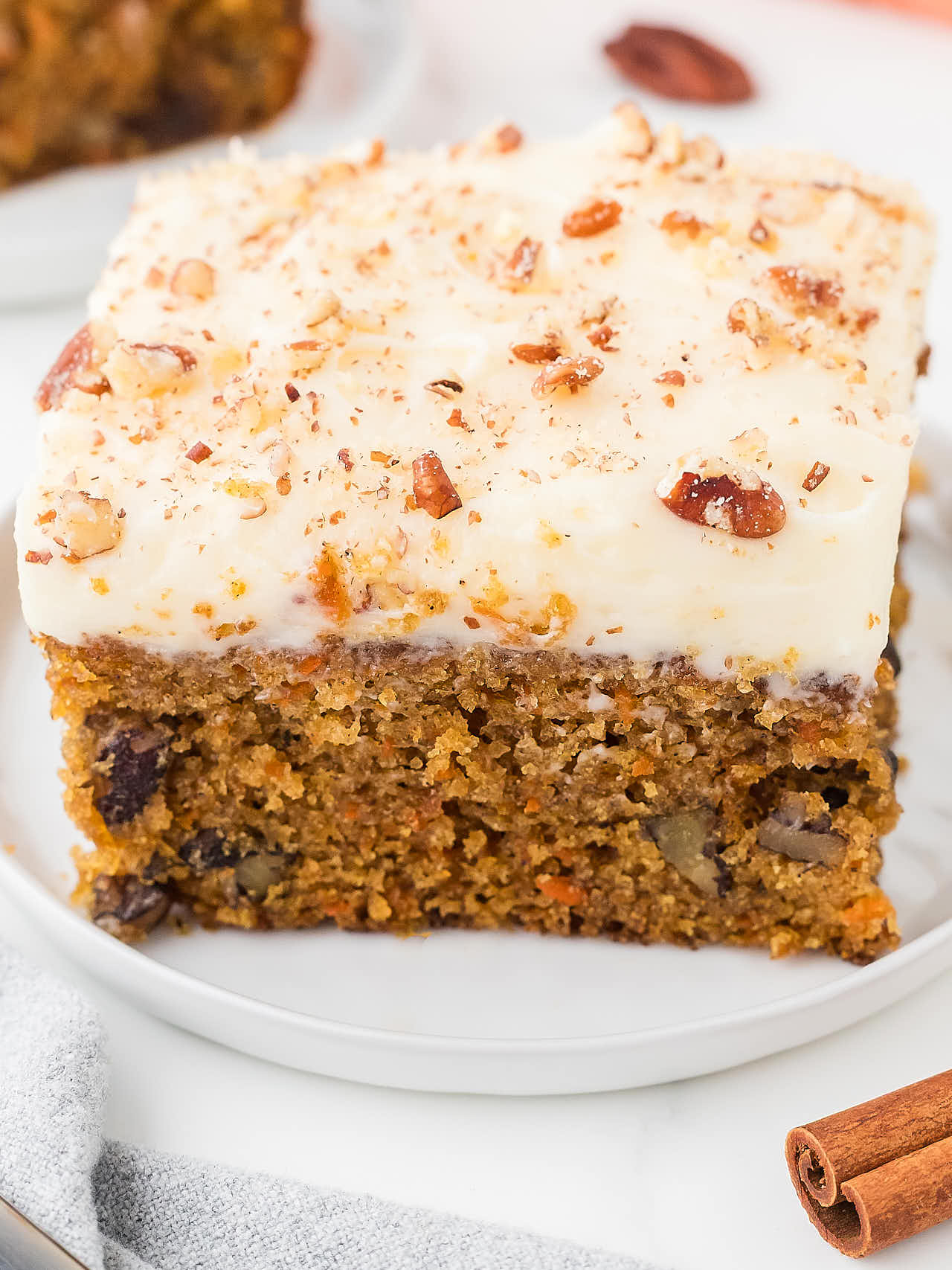 Carrot Cake served on a white plate.