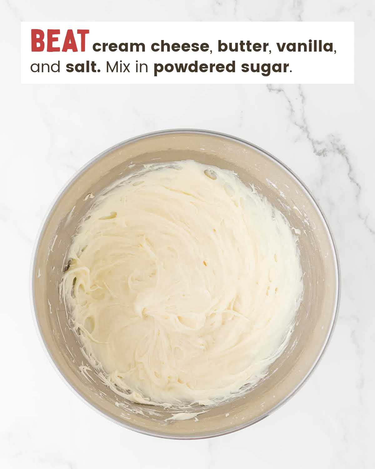 Frosting in a mixing bowl.