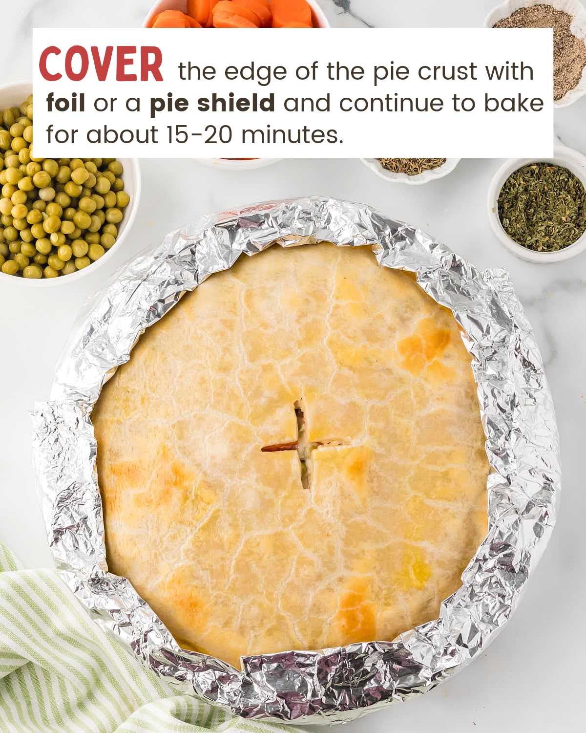 Chicken pot pie with foil covering the crust.