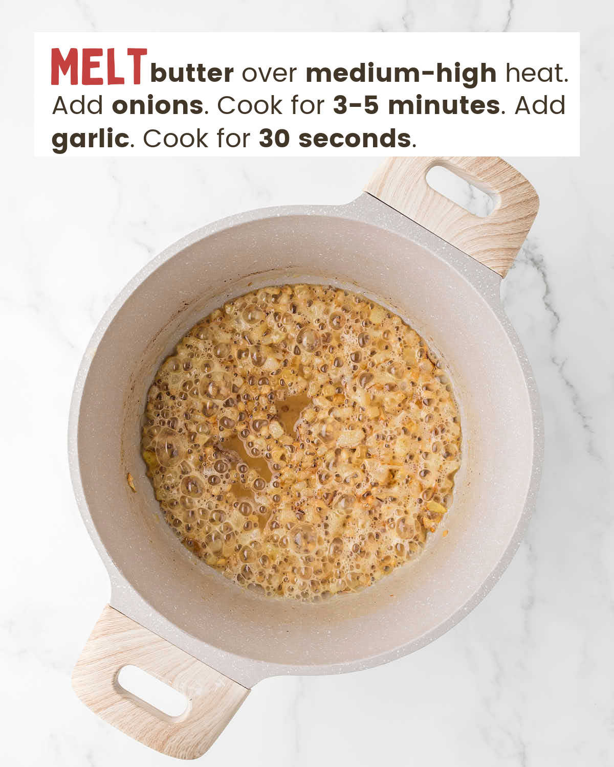 Chopped onions in melted butter in a pot.